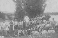 A group of men posing for a photo

AI-generated content may be incorrect.