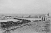 A black and white photo of a city

AI-generated content may be incorrect.