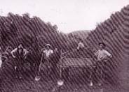 A group of men working in a field

AI-generated content may be incorrect.