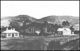 A group of houses in a valley

AI-generated content may be incorrect.